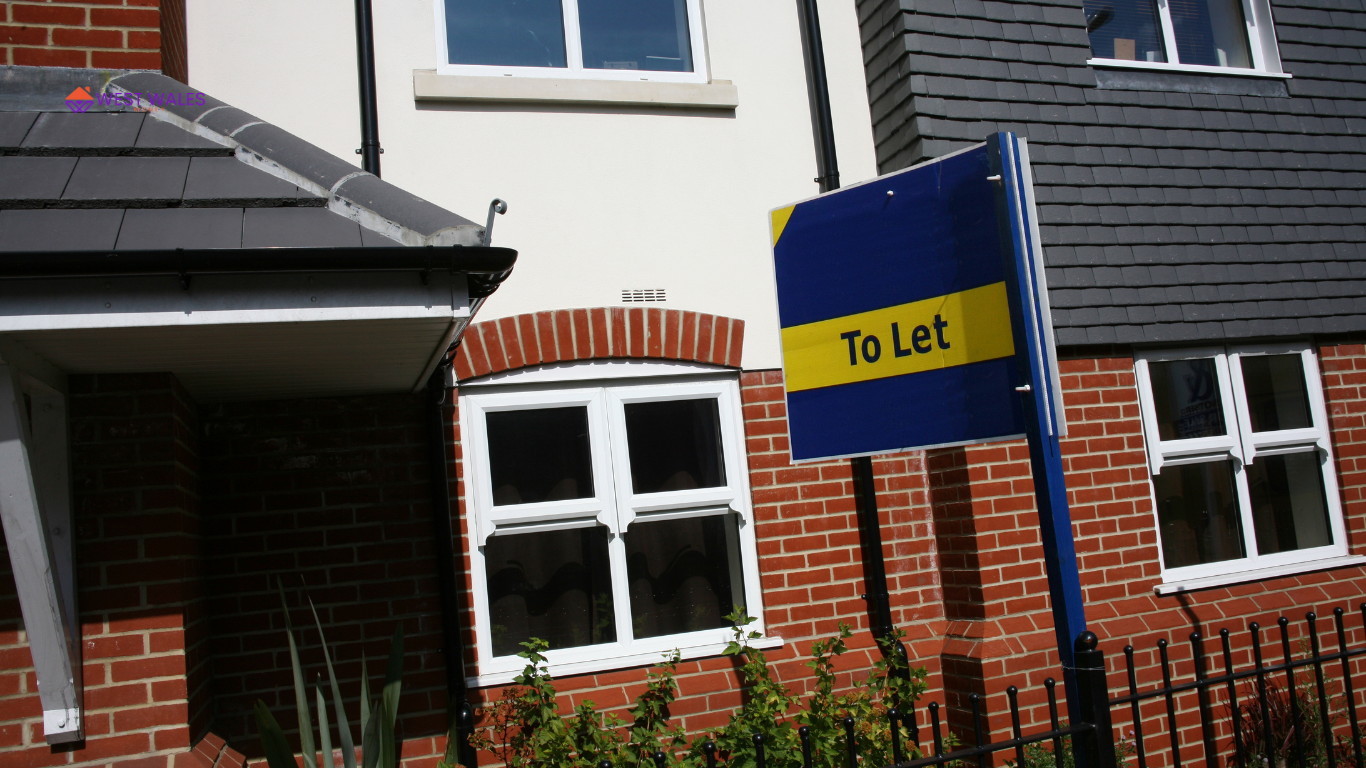 The image has a “To Let” sign in front of a modern, brick-built residential property