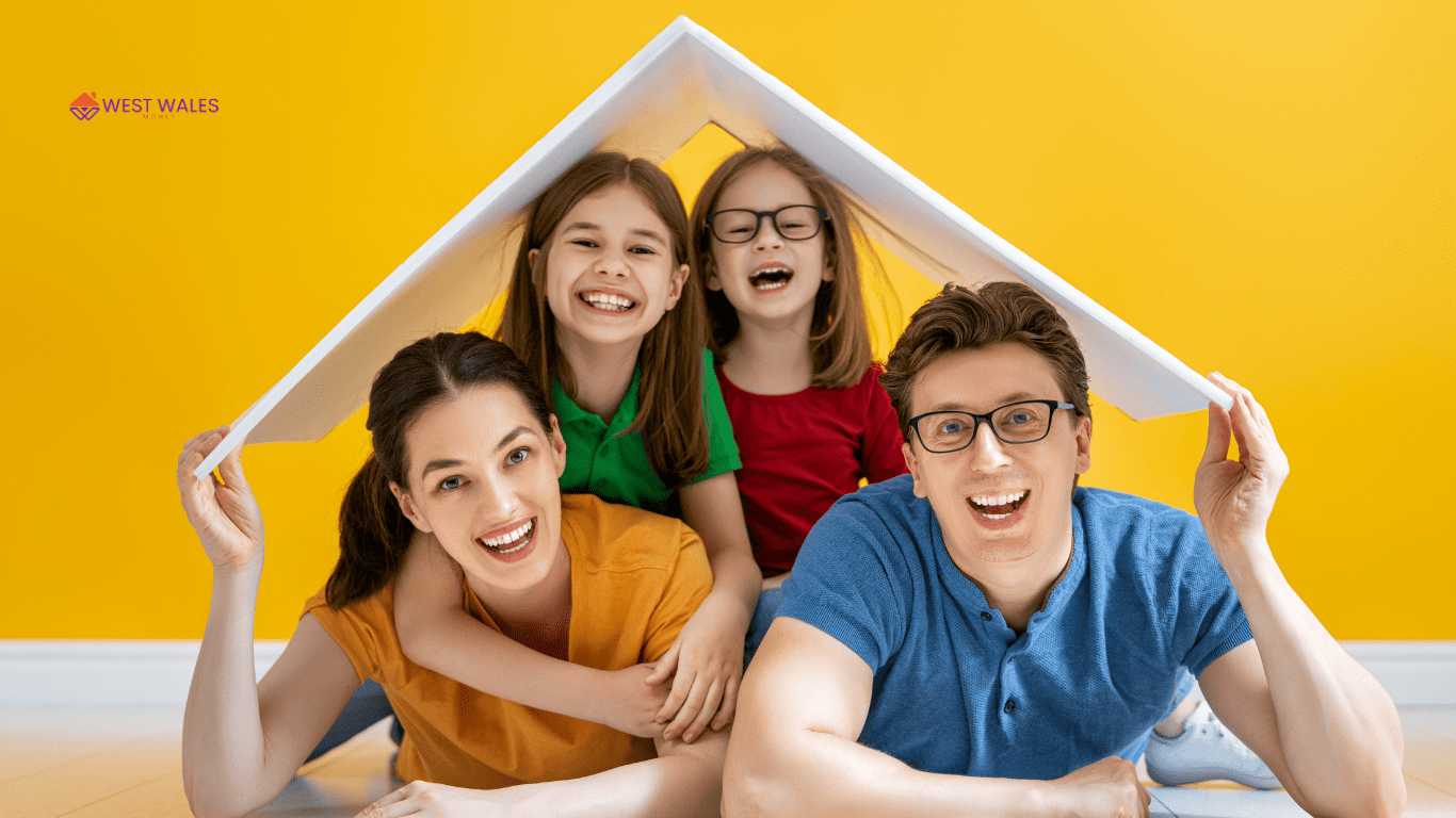 Happy family under a paper roof, symbolising mortgage protection keeping a safe home for the future.