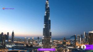 A panoramic view of a cityscape during twilight, with the iconic Burj Khalifa in Dubai towering over the city