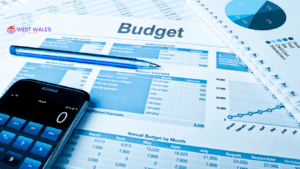 West Wales Budget Planner with tables of monthly expenses, additional income, and planned expenses,