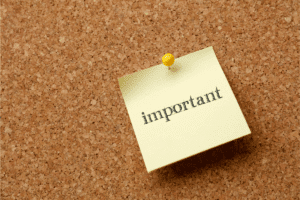 Sticky note marked 'important,' symbolising the critical importance of meeting the Interest Coverage Ratio (ICR) requirements in buy-to-let mortgage applications.