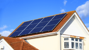 Solar panels installed on a UK rental property roof to meet new EPC rules for landlords by 2028.