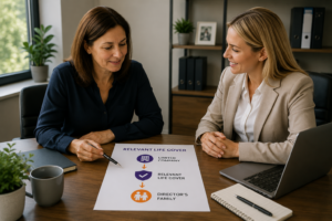 Female company director discussing personal life insurance and Relevant Life Cover options with a financial adviser.